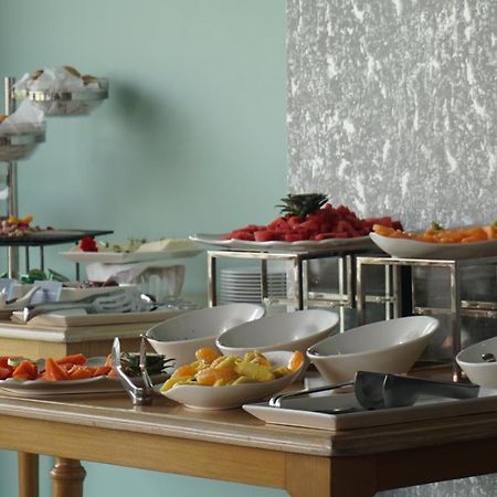 Quo Quality Hotel Манисалес Экстерьер фото A buffet