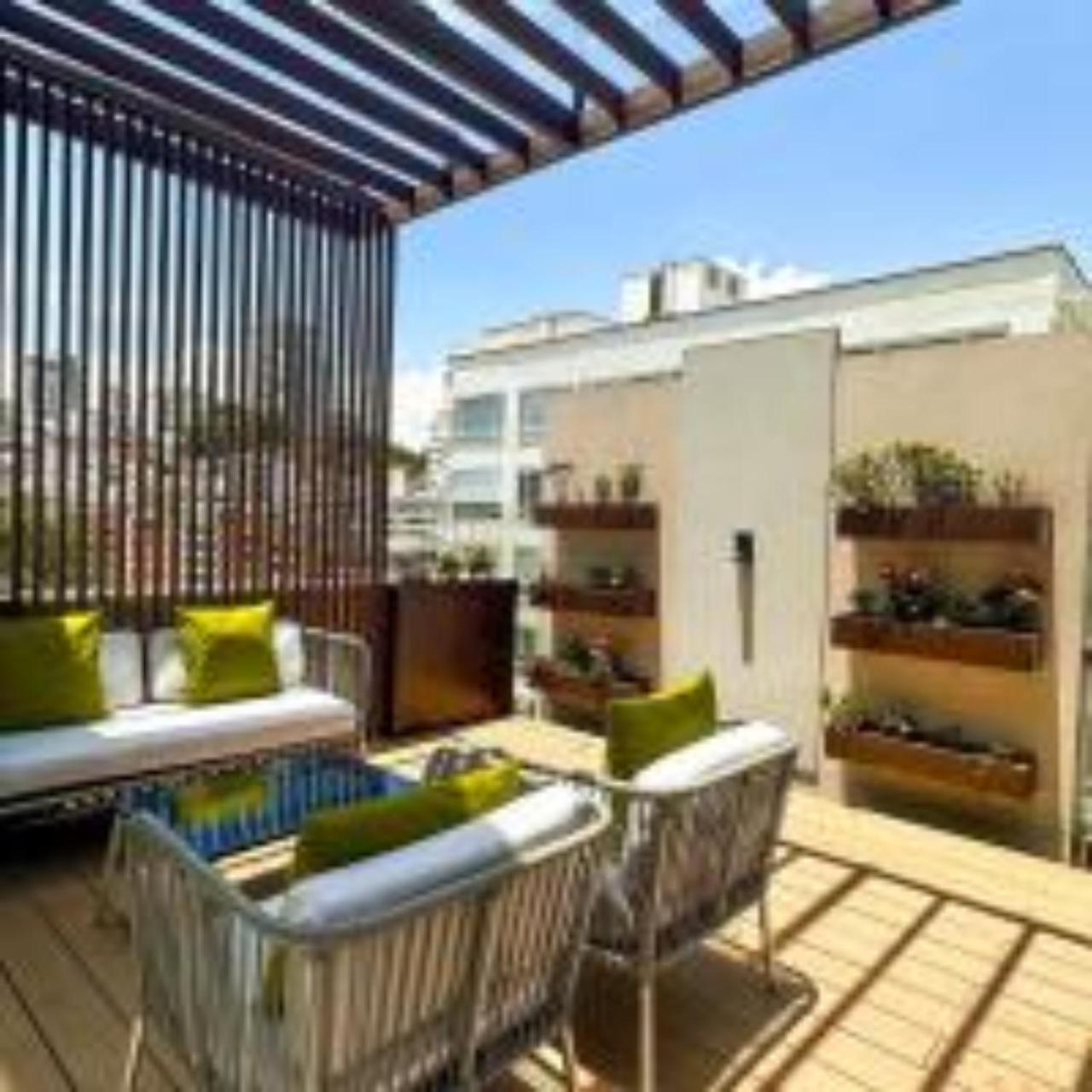 Quo Quality Hotel Манисалес Экстерьер фото A rooftop garden